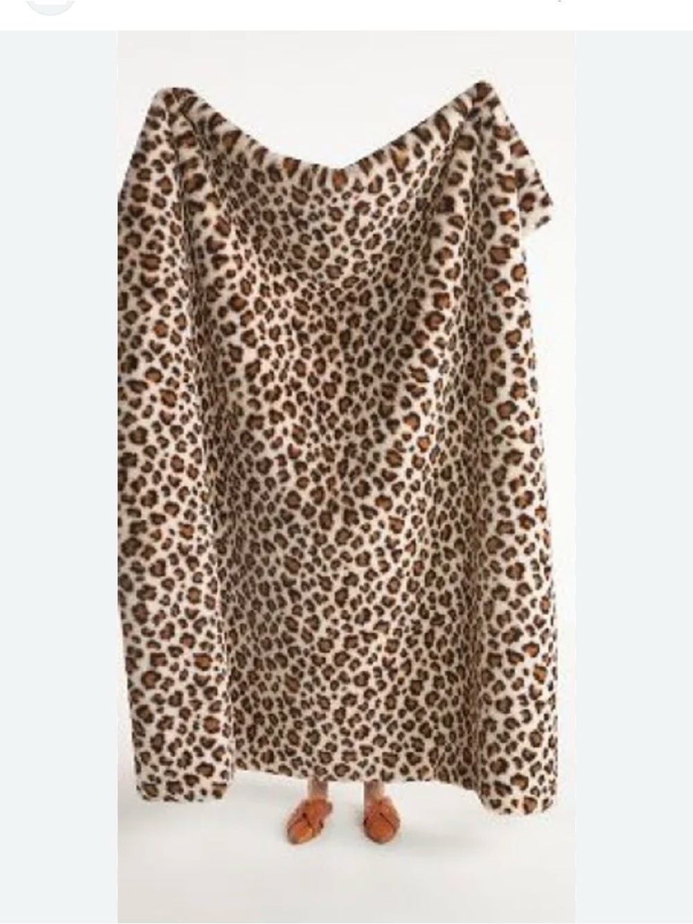 Anthropologie Chester faux fur leopard print throw blanket.